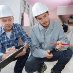 Two men performing a home inspection
