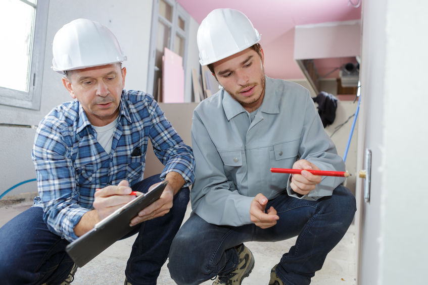 Two men performing a home inspection