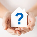 A home with a question mark- signifying questions people may have about the home inspection process